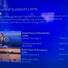 TV screen showing program details with images of Scottish lochs. Options: Delete, Watch, or Lock.