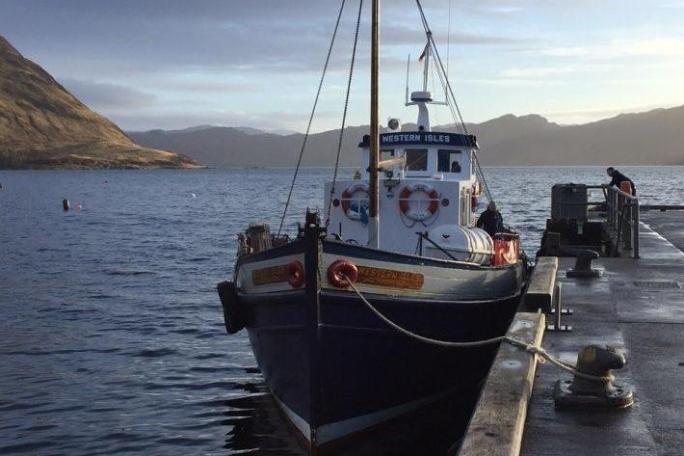 a small boat in a body of water