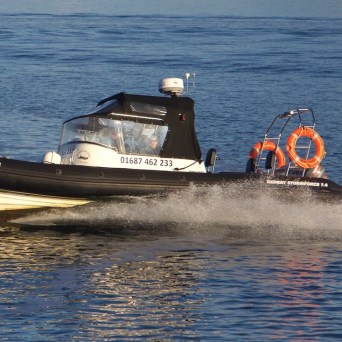 a small boat in a body of water
