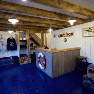 a white refrigerator freezer sitting inside of a room