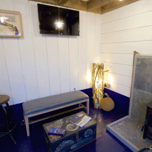 a room filled with furniture and a fireplace