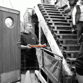 a man standing in front of a building