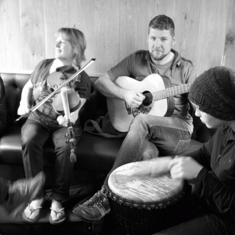 a group of people sitting in a chair