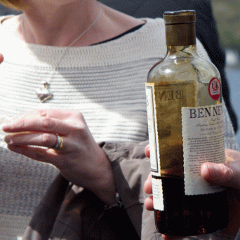 a person holding a glass of wine