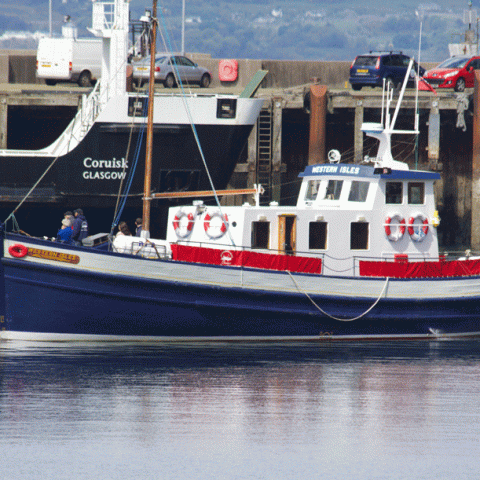 a small boat in a large body of water