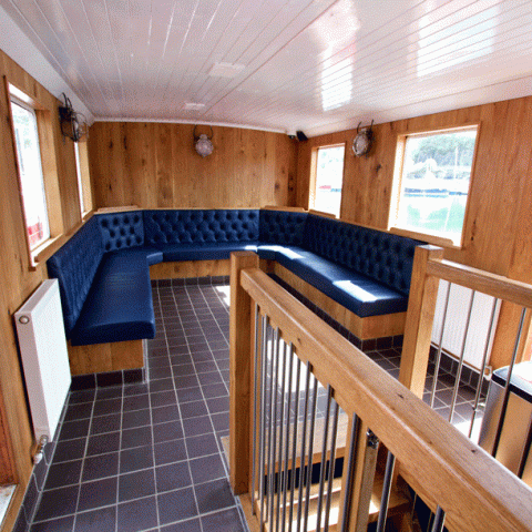 a wooden chair in a room