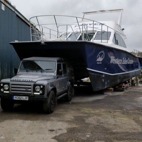 a truck is parked on the side of a road