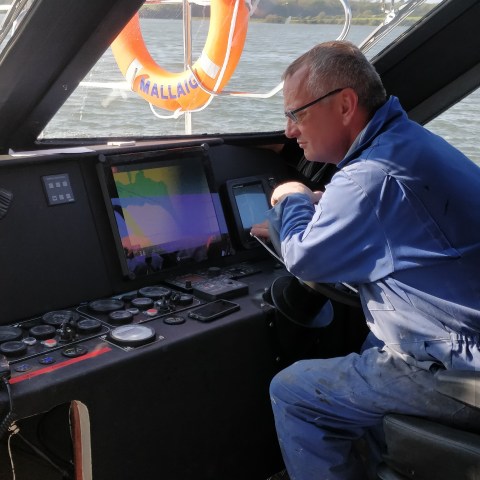 a man sitting on a bus