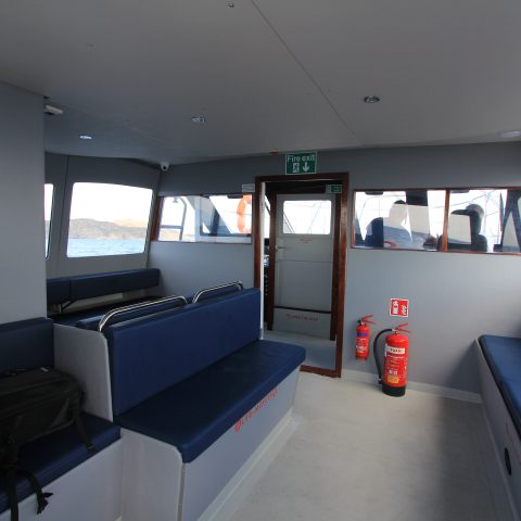 a bedroom with a large window