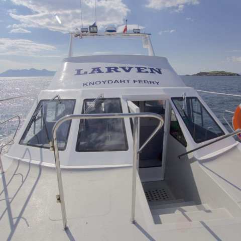 a small boat in a body of water