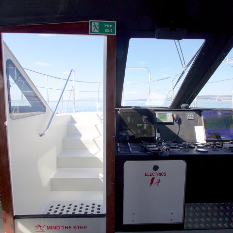 a person sitting in front of a laptop computer