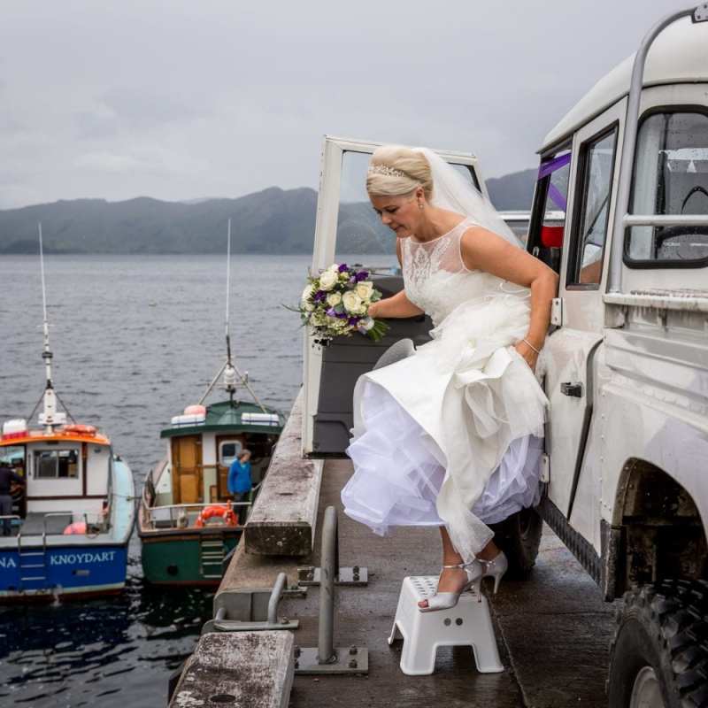 a group of people in a boat on a body of water