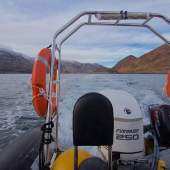 a boat sitting on top of a mountain