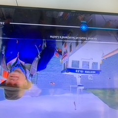 a person sitting on a boat in the water