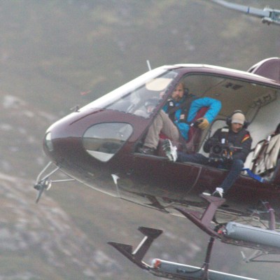 a helicopter flying in the air