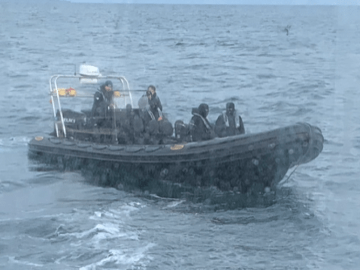 a small boat in a body of water