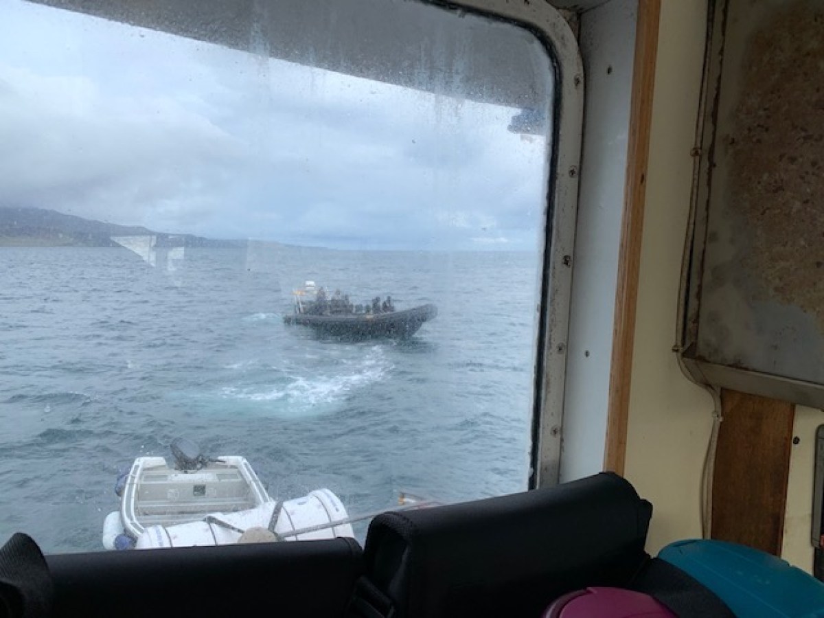 a small boat in a body of water