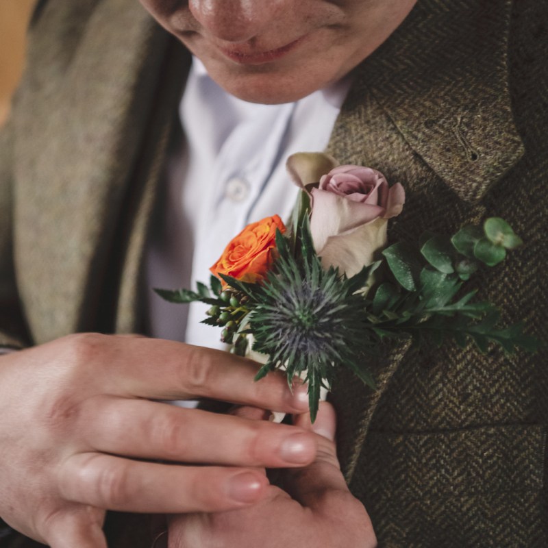 a man holding a flower