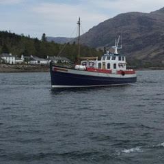 a small boat in a large body of water