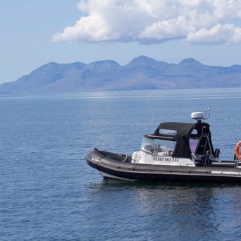 a small boat in a large body of water