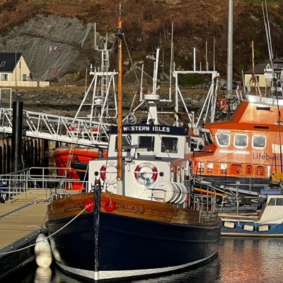 a boat is docked in a harbor